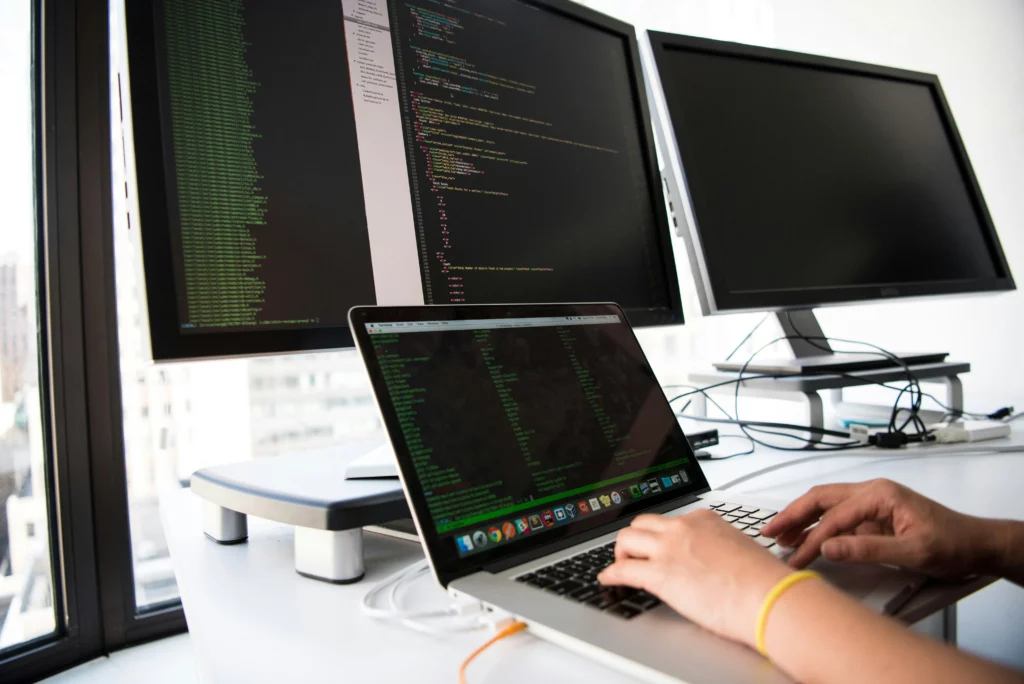 Developer working with code, showing how Gallup talents support IT team management, collaboration, and performance