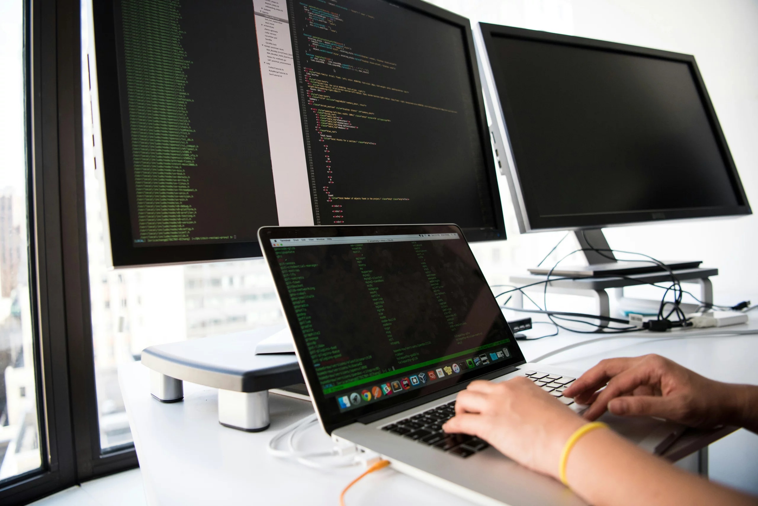 Developer working with code, showing how Gallup talents support IT team management, collaboration, and performance